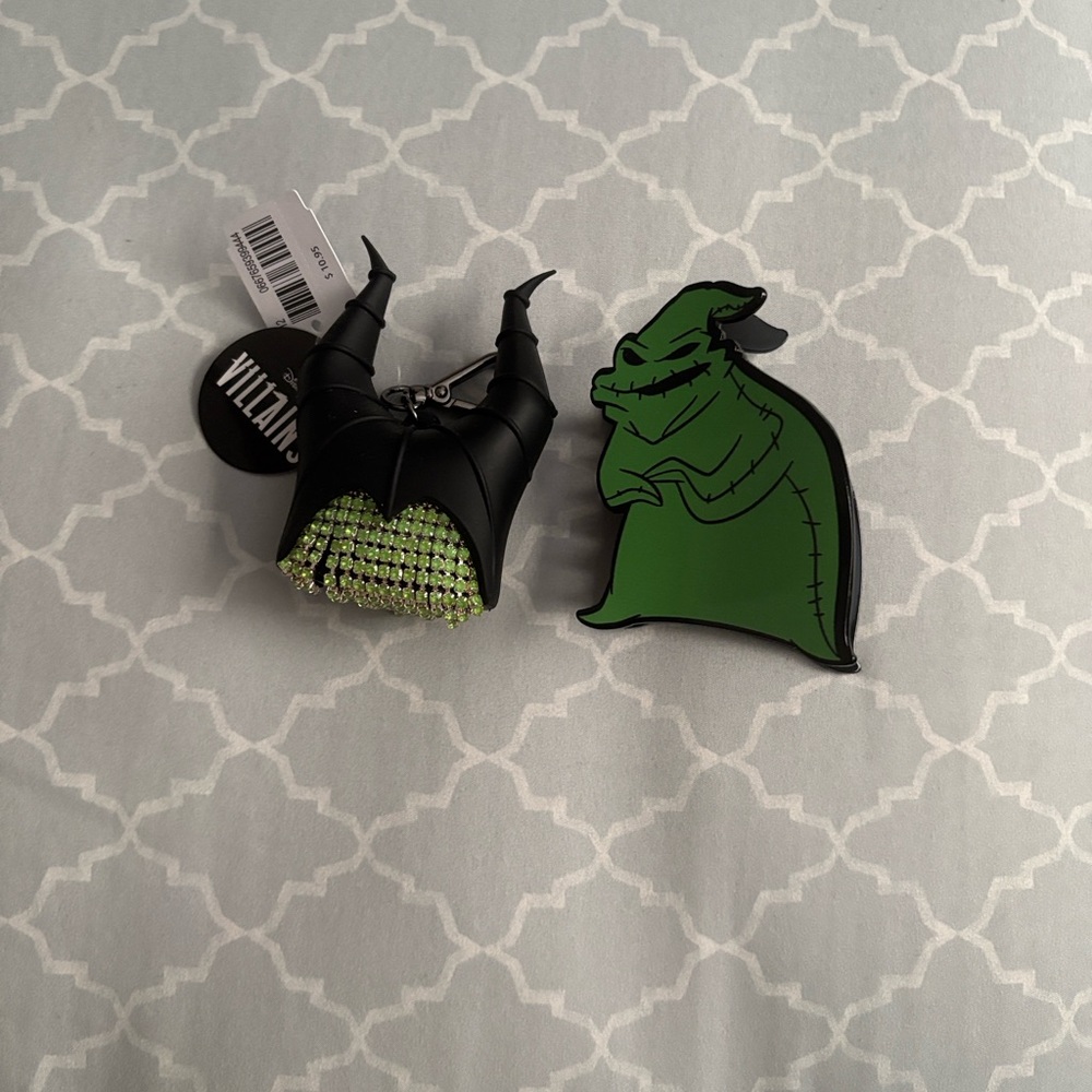 Disney Villains Maleficent B&BW hand sanitizer holder and Oogie Boogie Hair clip